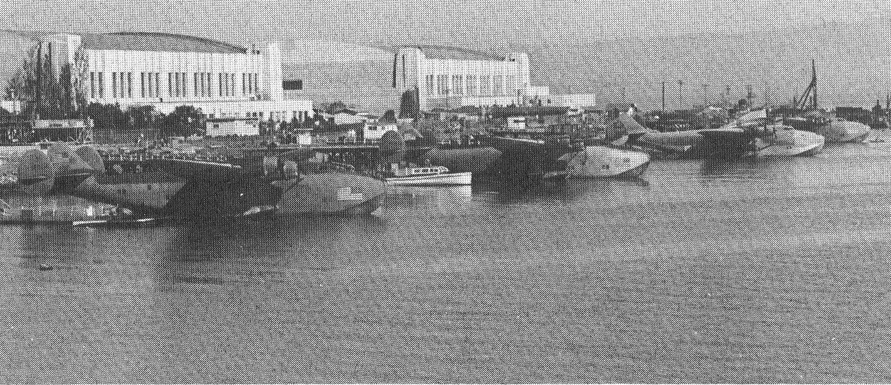 1944 July Four Boeing B314s in camoflage markings  moored Treasure Island, San Francisco, California